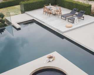 Outdoor Wishbone Chair featuring Elaine Dining Table in Black Marble